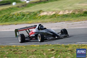 Graham Blackwell’s Mygale sprint car in motion on track during a competitive run