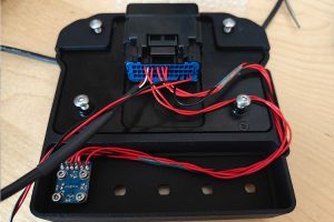 Rear view of Graham Blackwell’s custom bezel showing wiring and control input layout for SDM-330 display