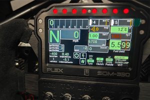 Close-up of the PLEX SDM-330 display with red shift LEDs and custom data layout in Graham Blackwell’s sprint car